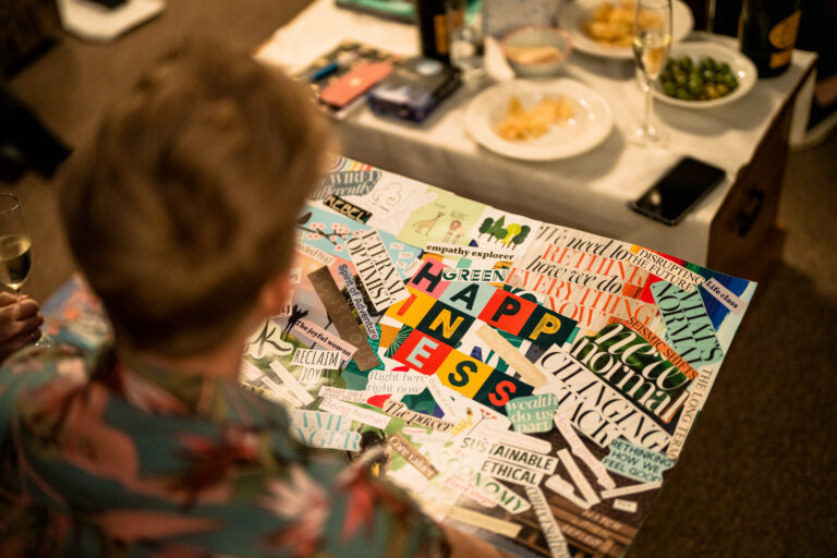 Woman holding vision board